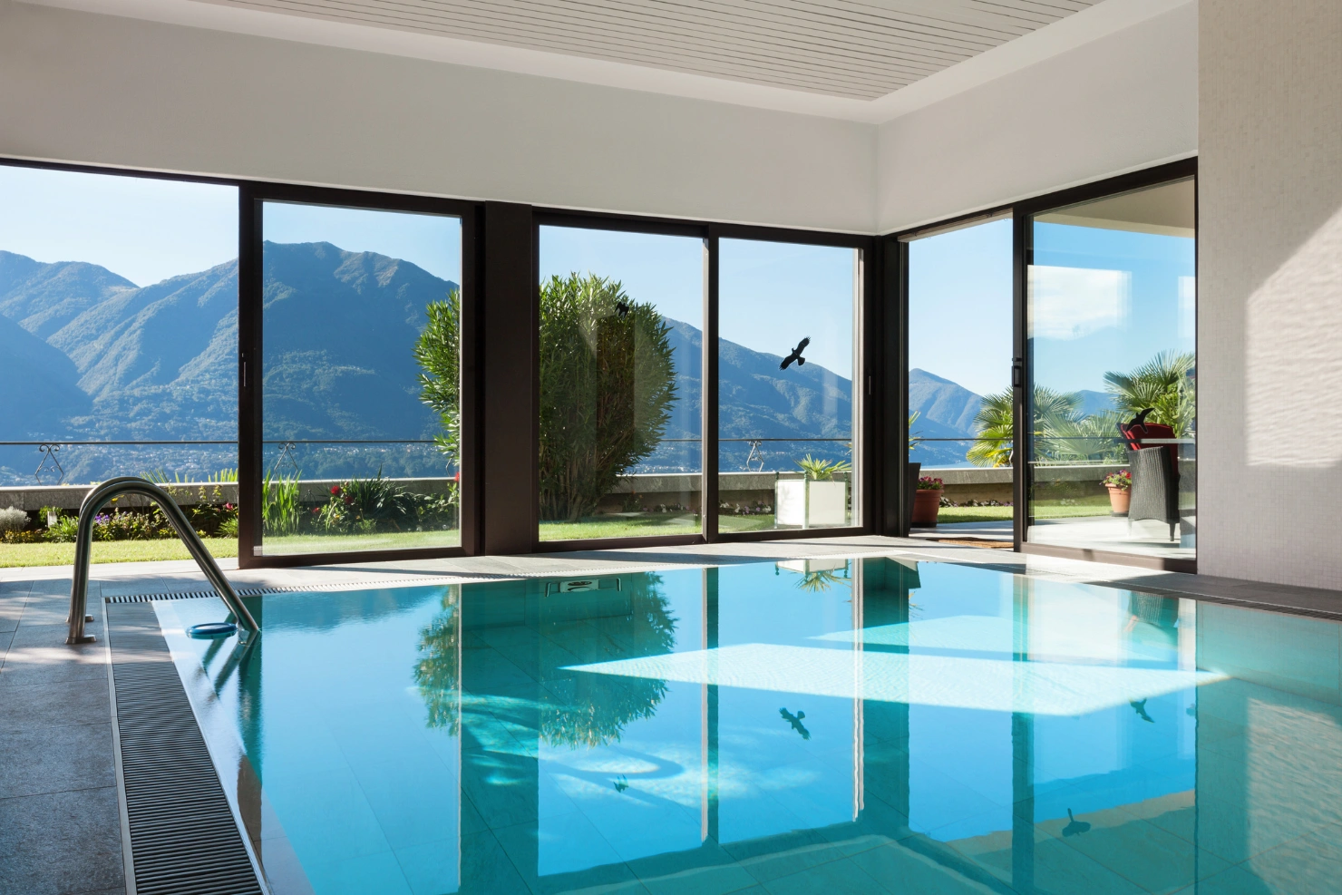 Indoor/Outdoor Pool Integration For Elegant Home Entertaining Indoor/Outdoor Pool Integration For Elegant Home Entertaining