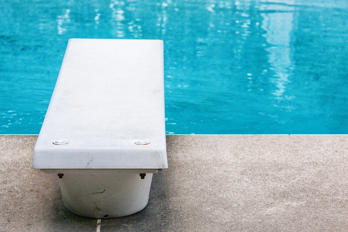 A Loose Diving Board Base Can Turn Pool Fun Into a Safety Risk A Loose Diving Board Base Can Turn Pool Fun Into a Safety Risk