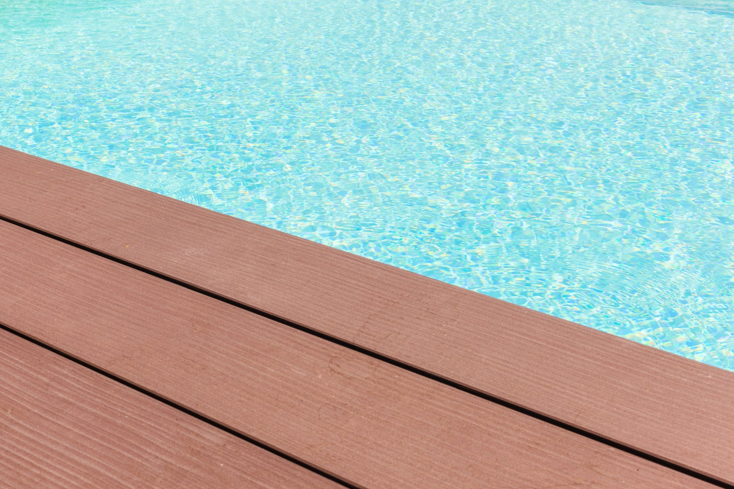 Summer Heat Is Changing What Homeowners Want From Pool Deck Surfaces Summer Heat Is Changing What Homeowners Want From Pool Deck Surfaces